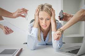 How can employers help their staff with work-related stress?